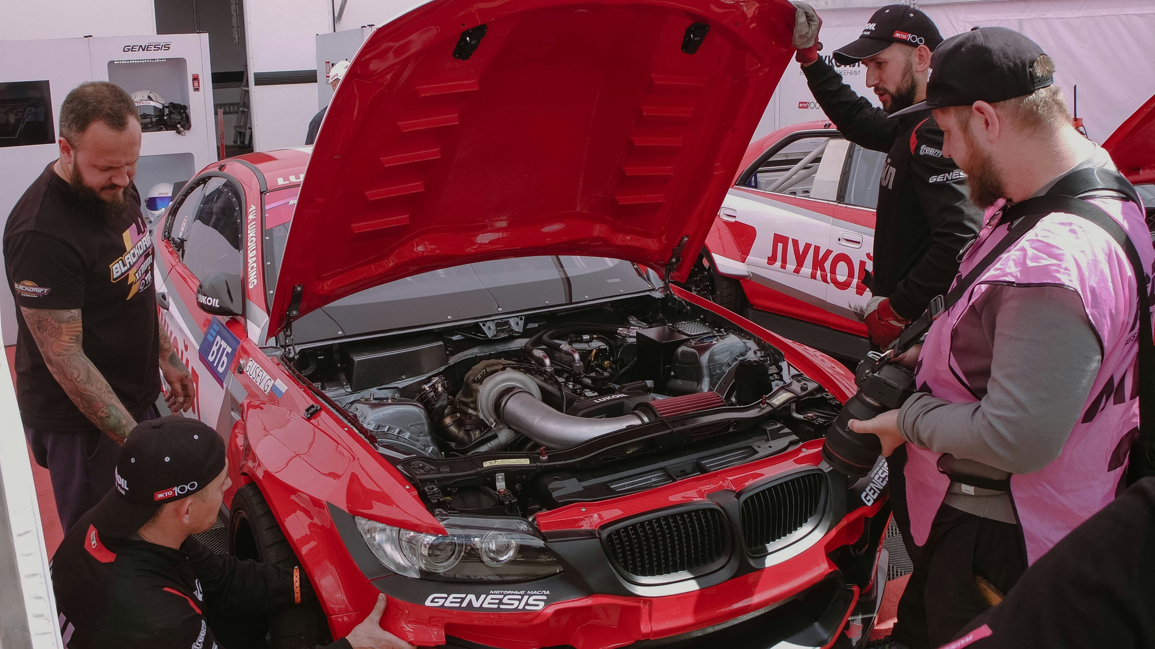 Technicians reviewing a repair plan together